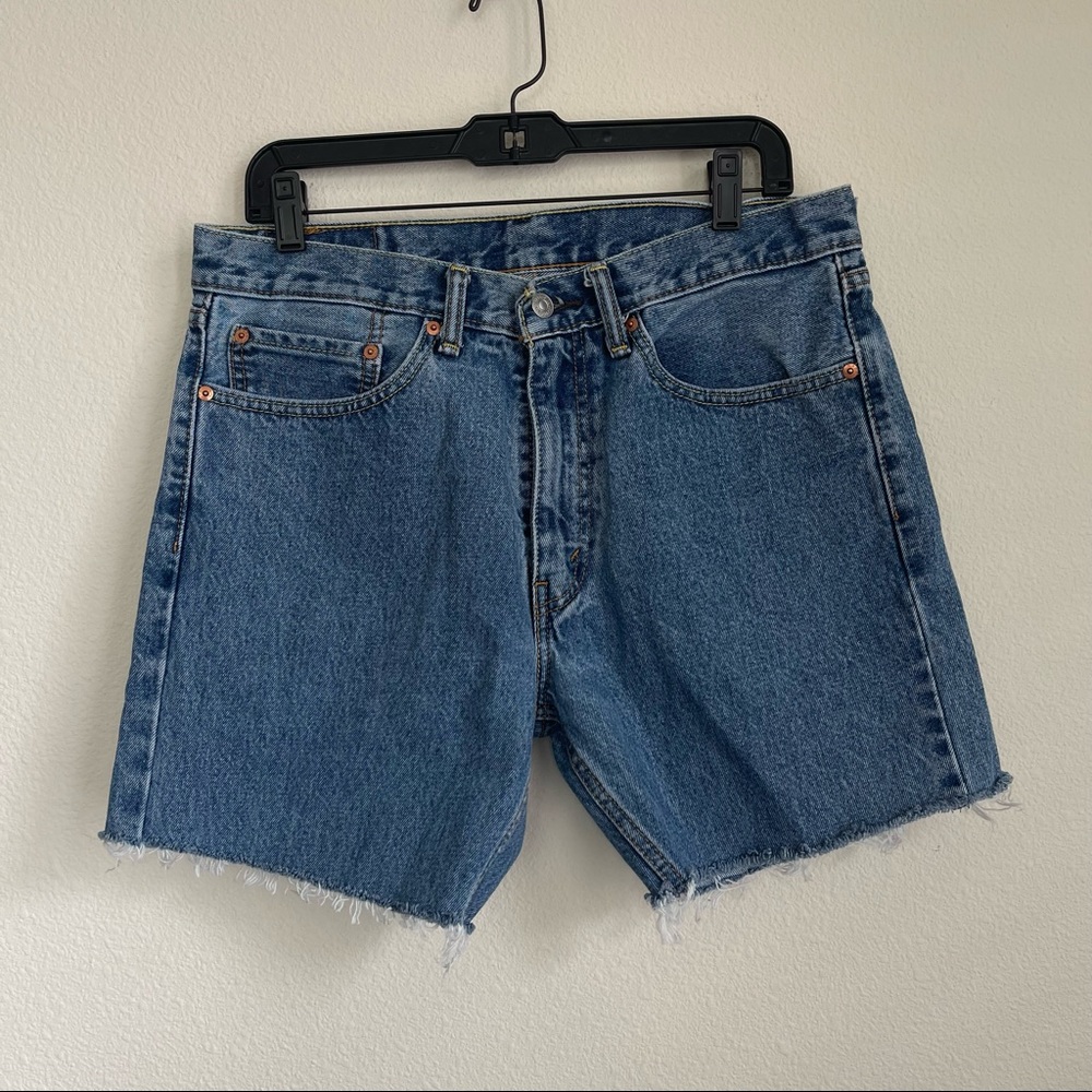 Levis Frayed Leg Opening Denim Jeans